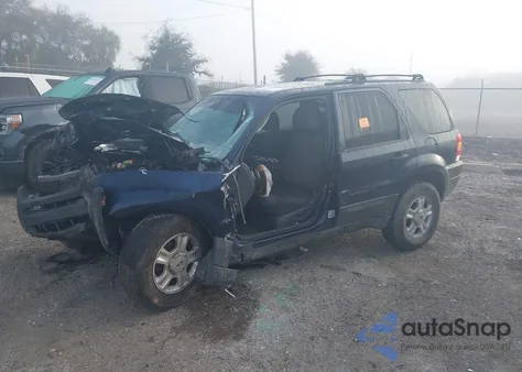 2003 Ford Escape Xlt z USA, uszkodzony, nr VIN 1FMYU03163KC65831